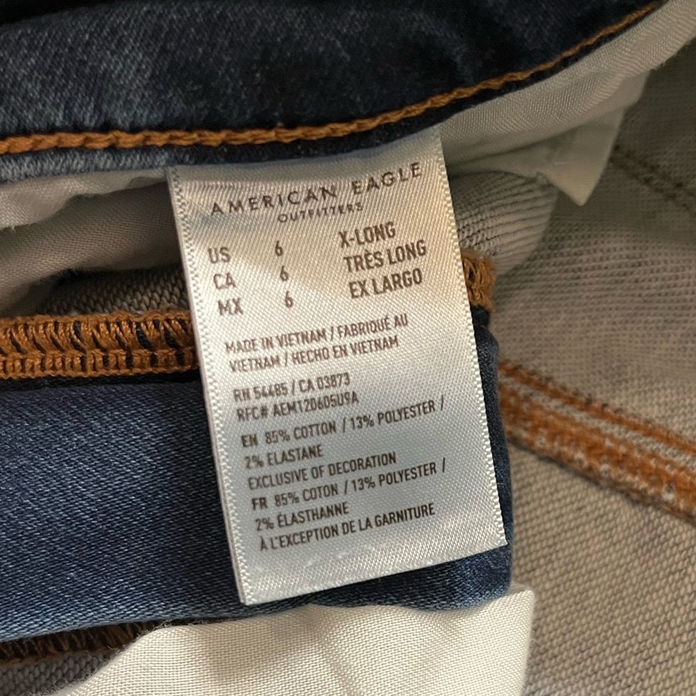 American Eagle Outfitters | Women's Distressed Hi-Rise Soft Knit Skinny Jeans - Picture 7 of 7